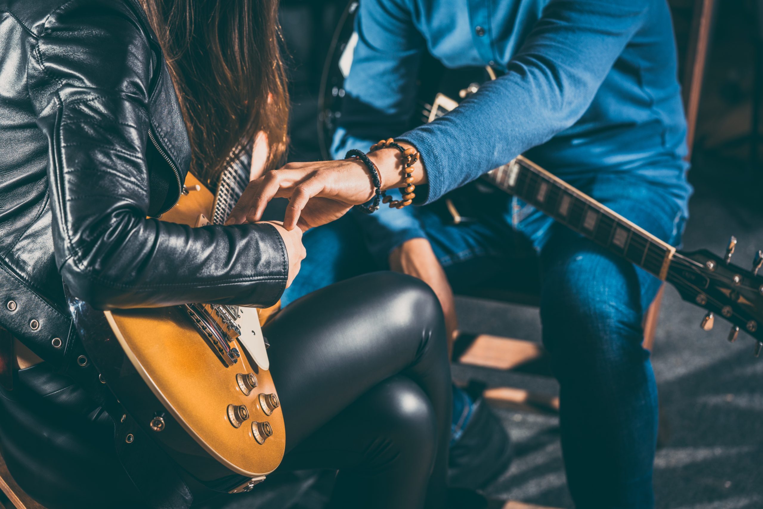 Guitar,Music,Teacher,Helping,His,Student,To,Play,,Closeup,On